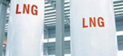A factory with industry pipes, storage tanks, and cylinders made of plastic, steel, and aluminum. Engineering at work in the production of LNG.